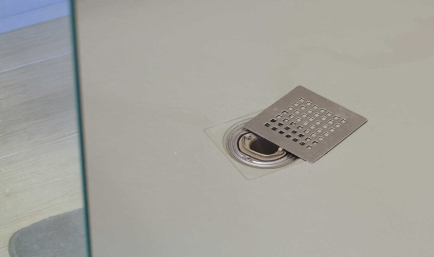 Shower drain grate