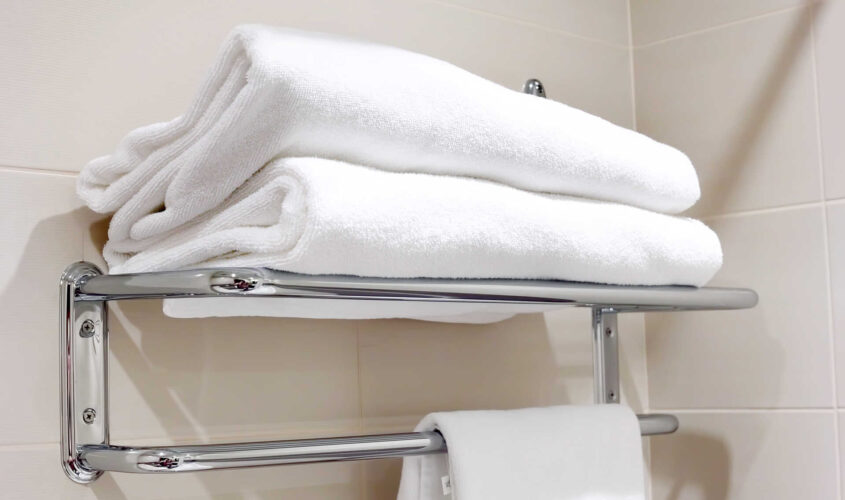 Clean white towel on a hanger.