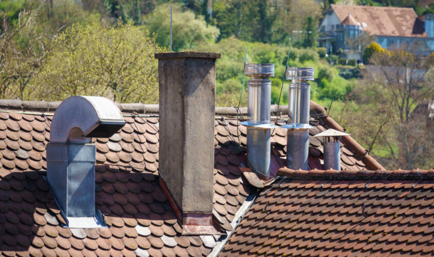 Roof with different chimneys