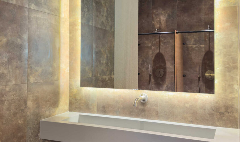 Backlit mirror. Minimalist sink. Spa bathroom